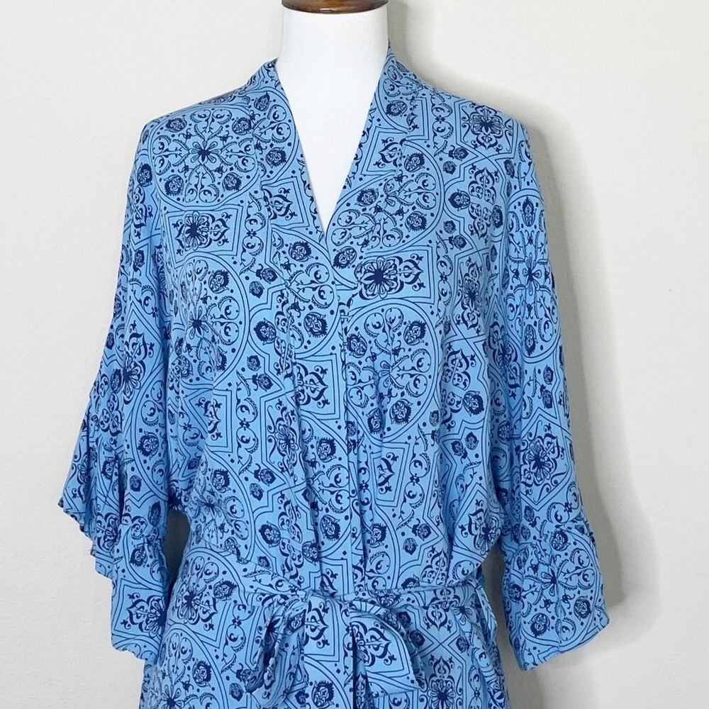 Ruby Ribbon Ruffle Wrap Blue Floral Top - Picture 4 of 13